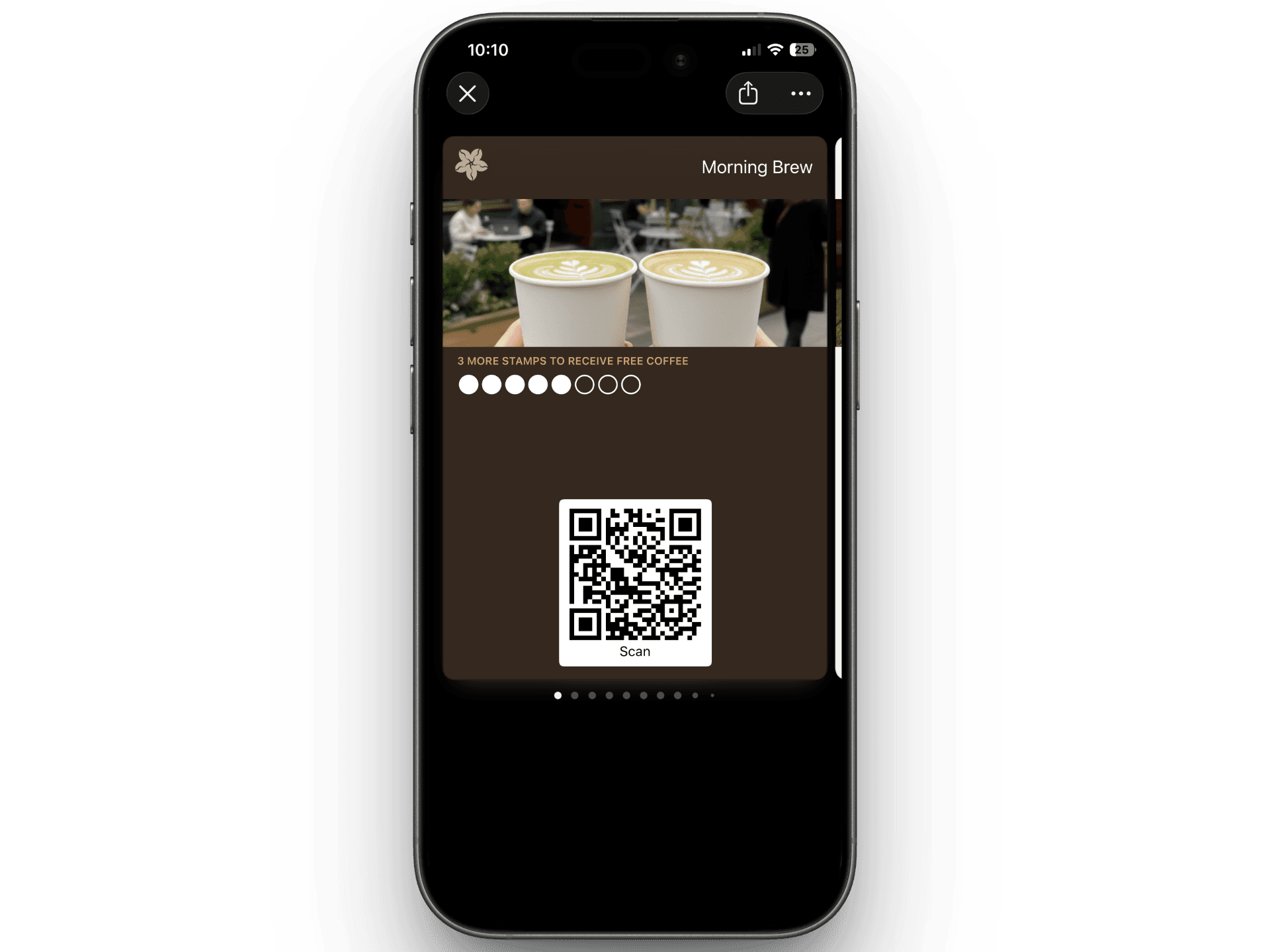 Phone showing stamp card with 5 out of 8 stamps collected alongside the scanner app