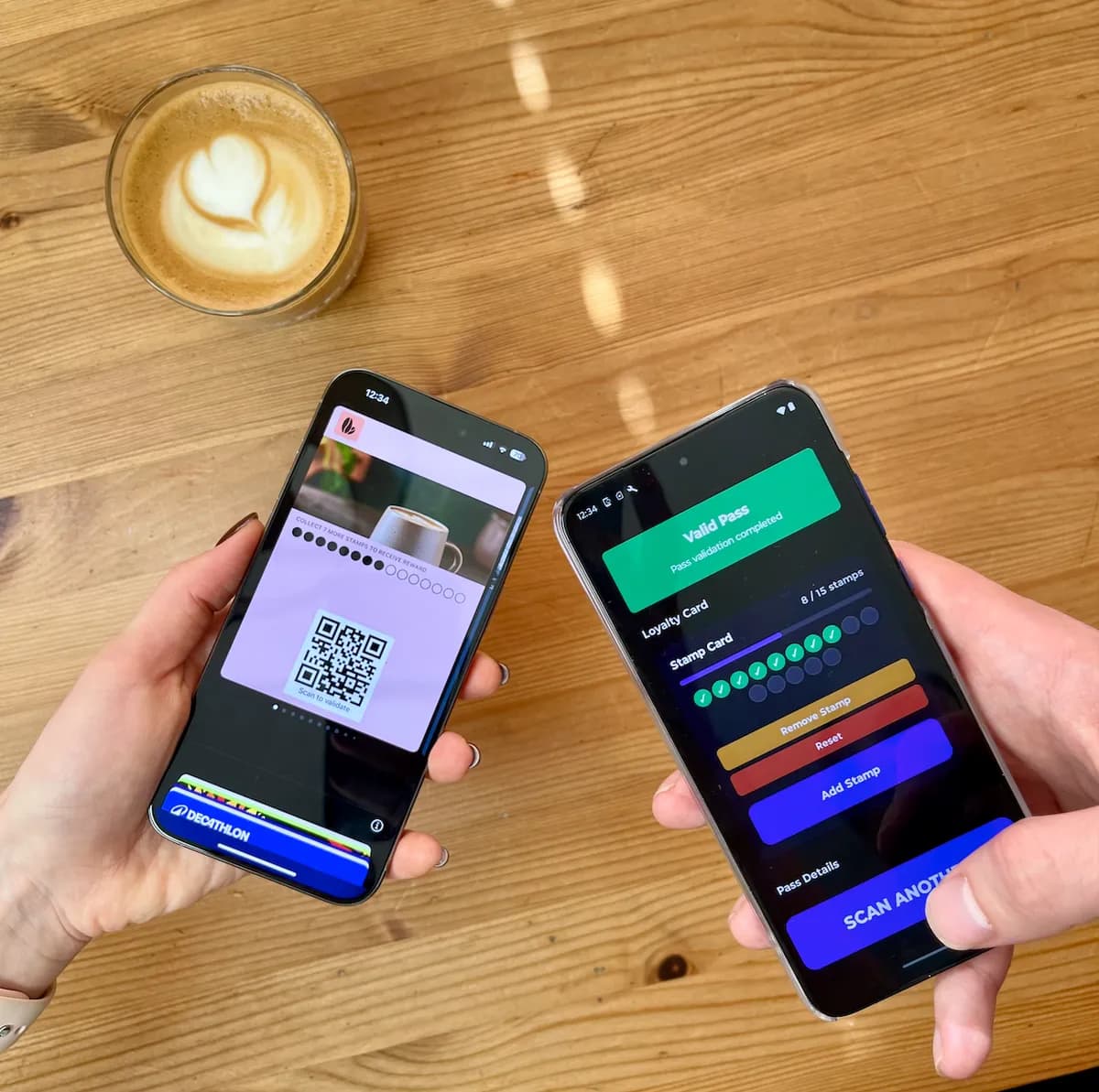 Staff scanning a customer's QR code with their phone