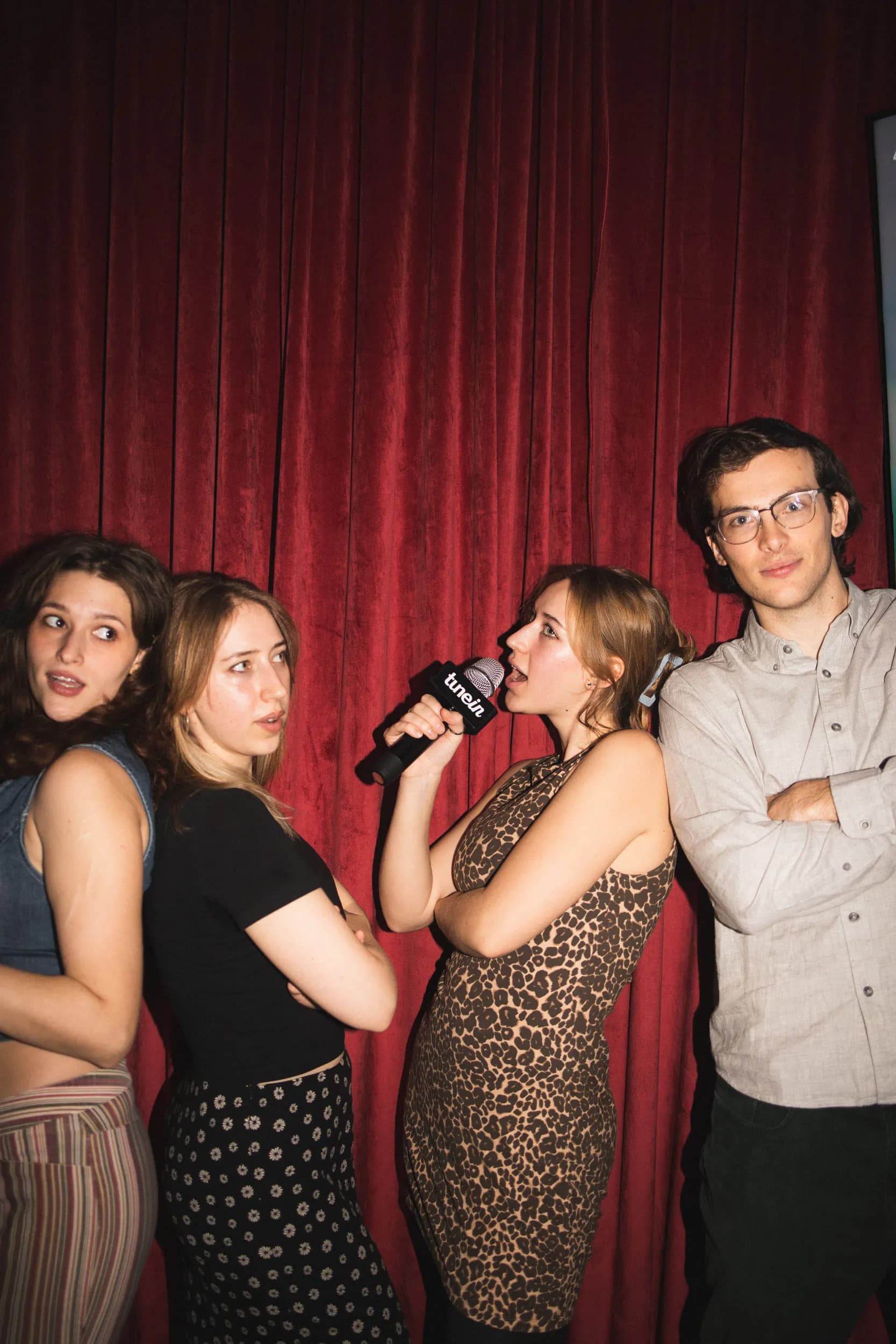Friends singing at Tune In karaoke