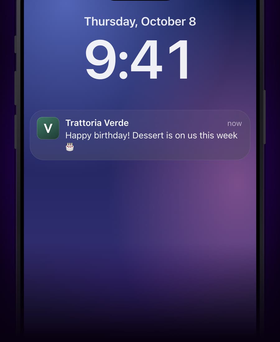 The birthday message from Trattoria Verde on an iPhone lock screen