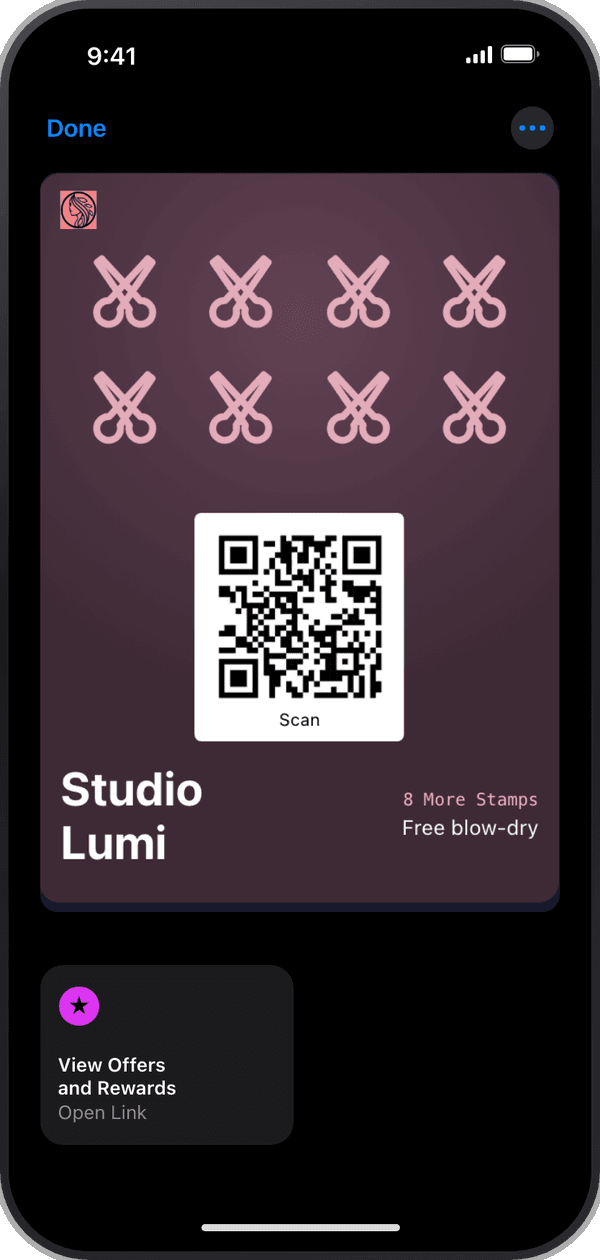 A client's Studio Lumi stamp card, open in Apple Wallet on an iPhone